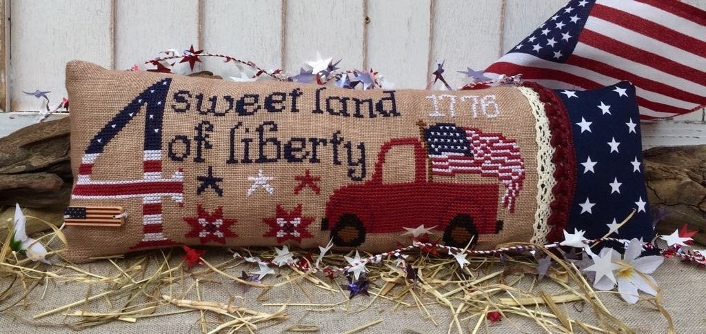 Rovaris ~ Sweet Land of Liberty  (look at that red truck!)